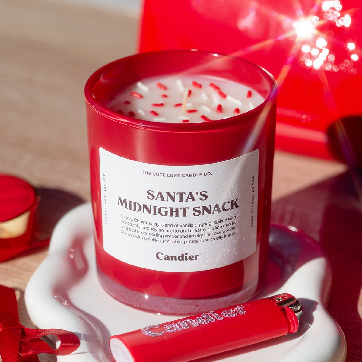 Candier christmas candles with festive red glass and holiday sprinkles, best gourmand scent and luxe vanilla fragrance