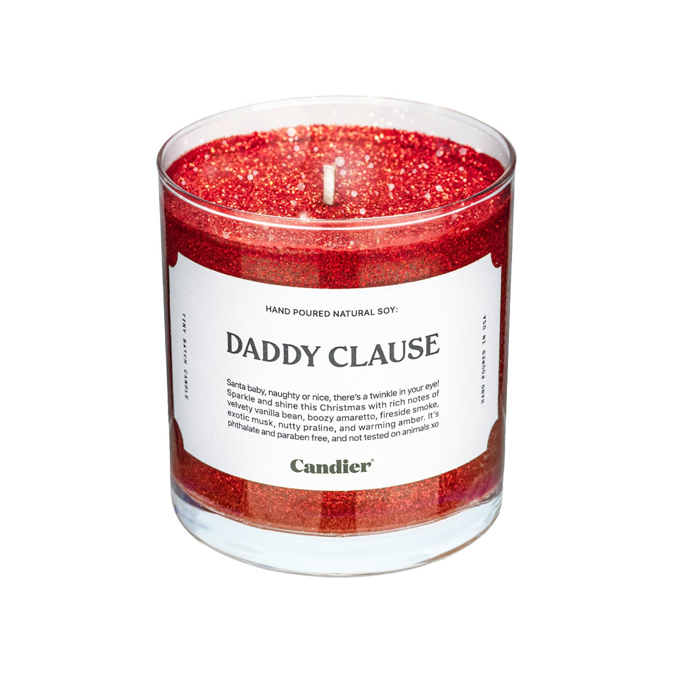 A festive Christmas red scented candle with plant based sparkly glitter and a label that reads Daddy Clause by Candier
