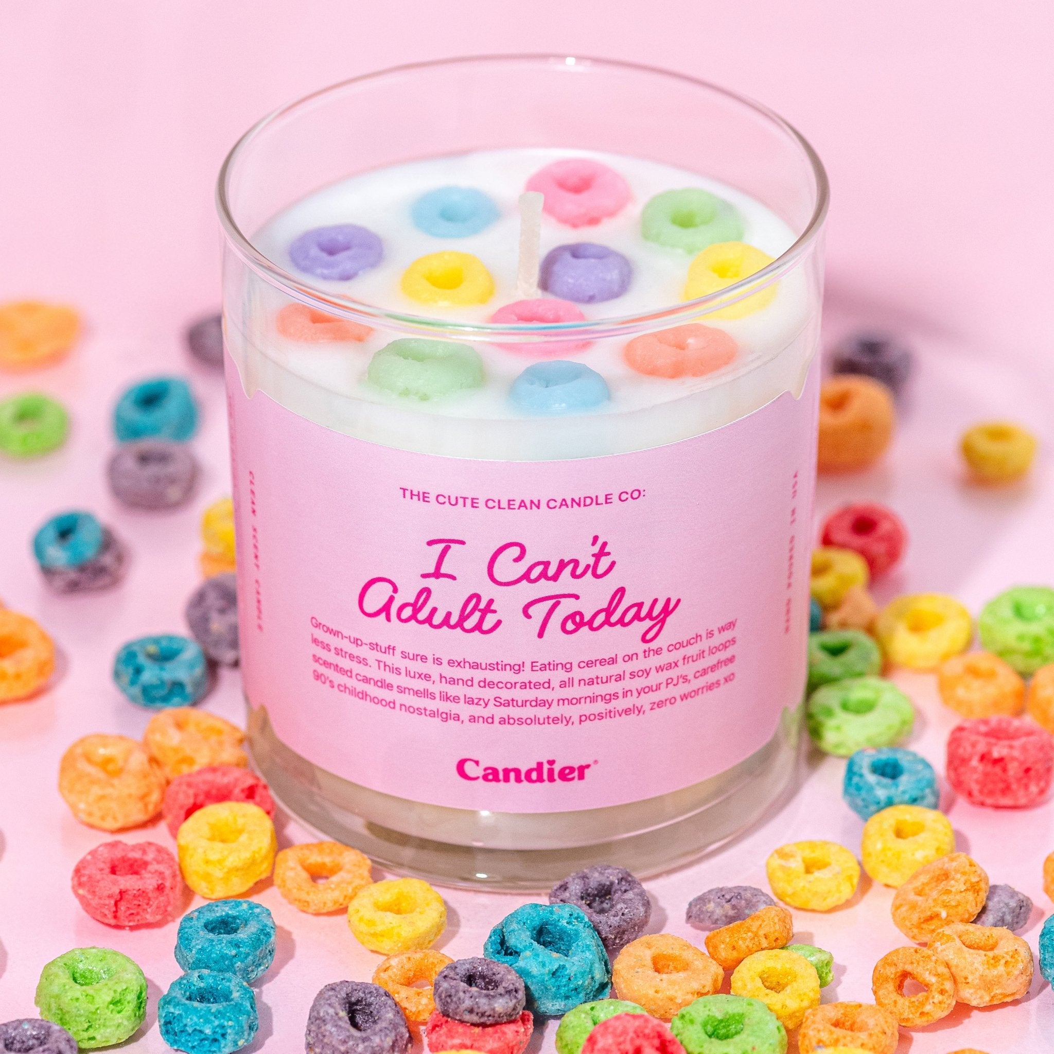 Froot loop candle I CANT ADULT TODAY CEREAL CANDLE by candier, surrounded by real fruit loops