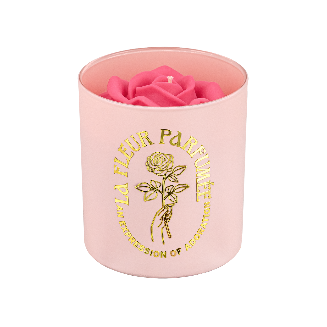 An elegant luxurious light pink candle with a gold emblem that reads La Fleur Parfumée An Expression of Adoration, and is topped with a hot pink sculpted wax rose