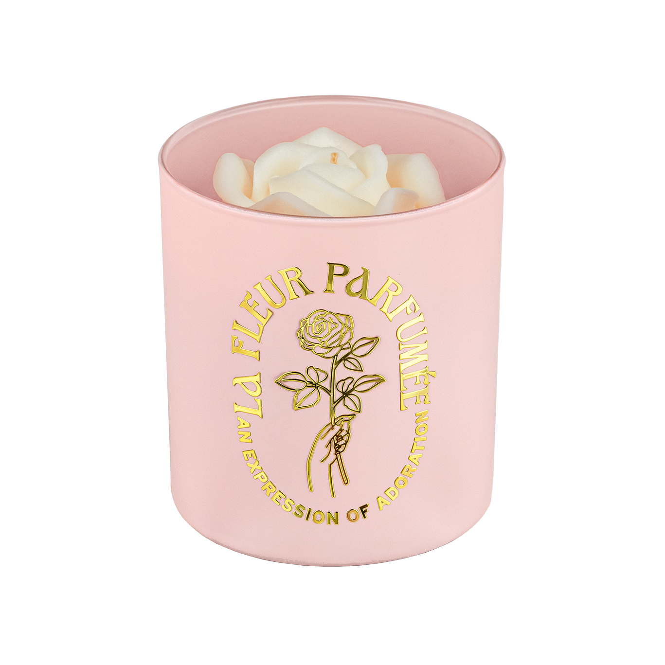 An elegant luxurious light pink candle with a gold emblem that reads La Fleur Parfumée An Expression of Adoration, and is topped with a white sculpted wax rose