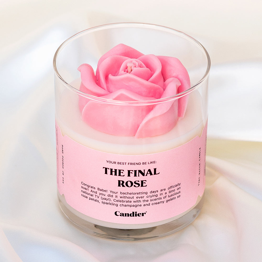 a sculpted rose candle with a label that reads The Final Rose