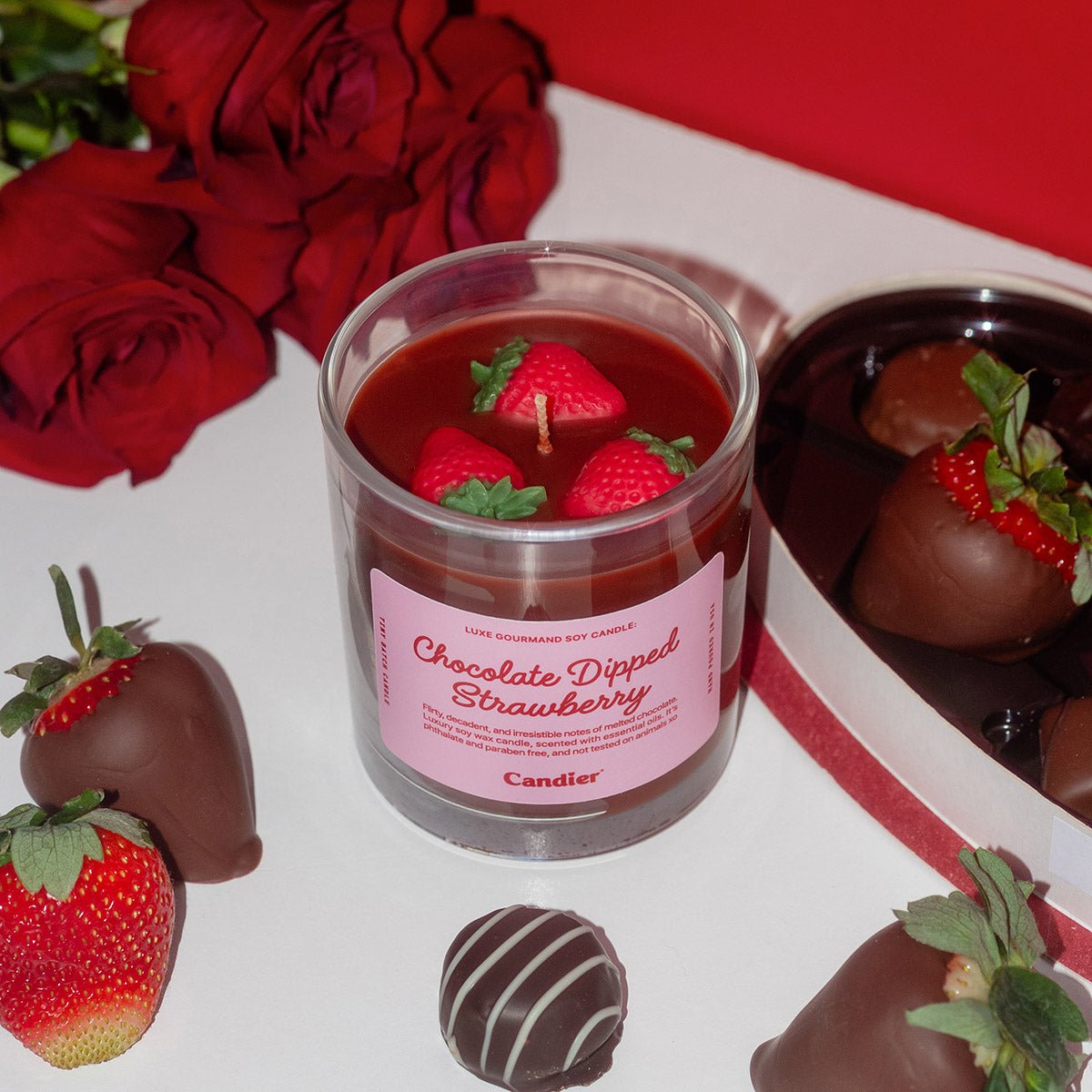 Candier Chocolate Dipped Strawberry dessert candle styled as a luxury gift with chocolate strawberries and romantic Valentine’s decor