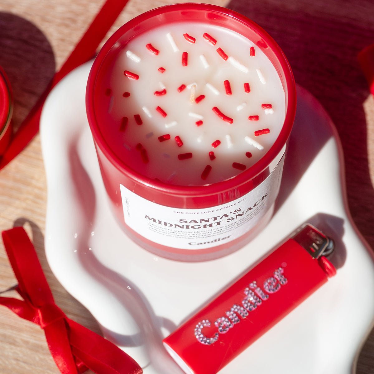 Santaās Midnight Snack styled for gifting ā cute aesthetic lux candle; best Secret Santa gifts and white elephant gift ideas $50.