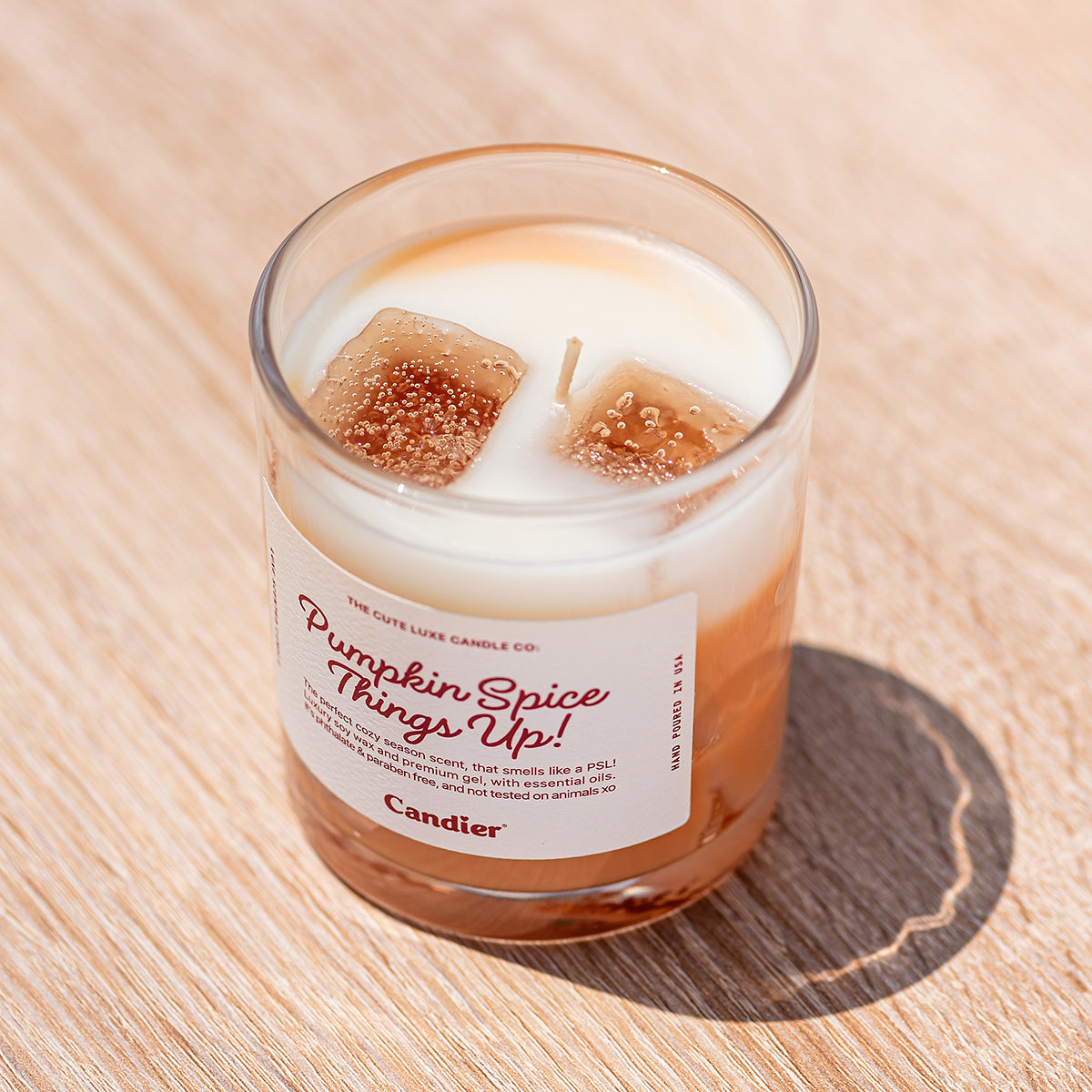 Candier pumpkin spice latte candle with whipped topping wax detail, dessert candle and food scented candle for cozy fall vibes.