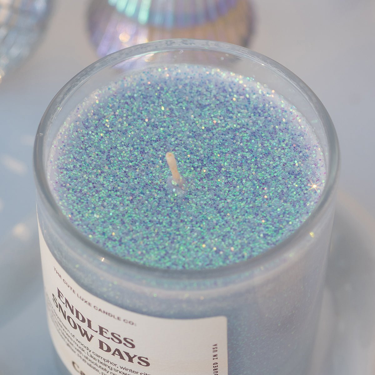 Sparkling top view of the winter candle—luxe aesthetics meets cute aesthetic; great christmas gift teens and best Christmas gifts for mom, suitable for Hanukkah gifts too.