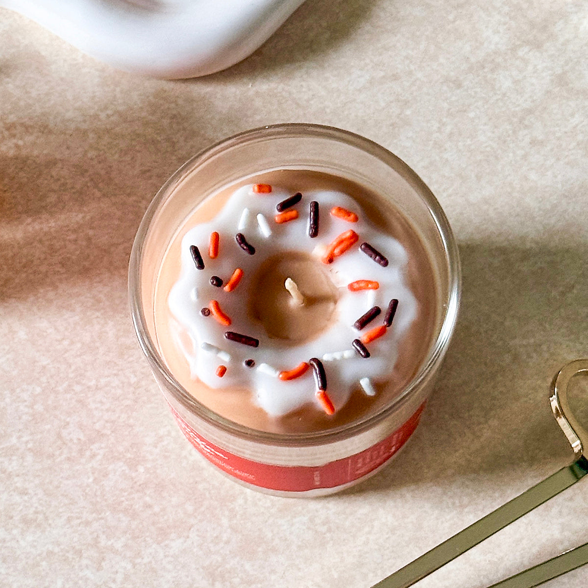 Candier pumpkin spice candle with sprinkles donut topper, luxe fall dessert candle hand-poured in USA.