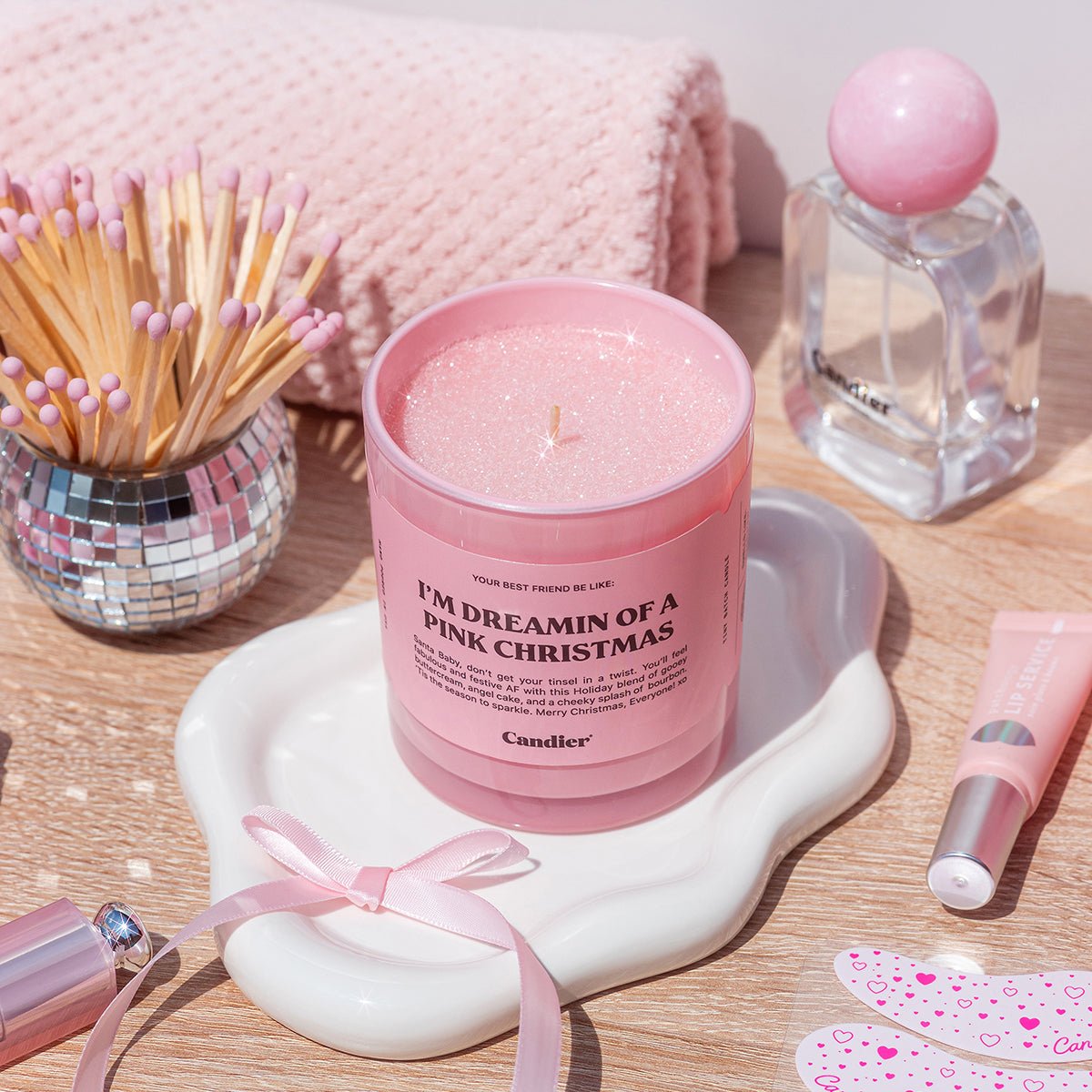 Candier pink candle styled with vanity decor â cute room decor and pretty candle for Christmas gift ideas for teens and sisters.