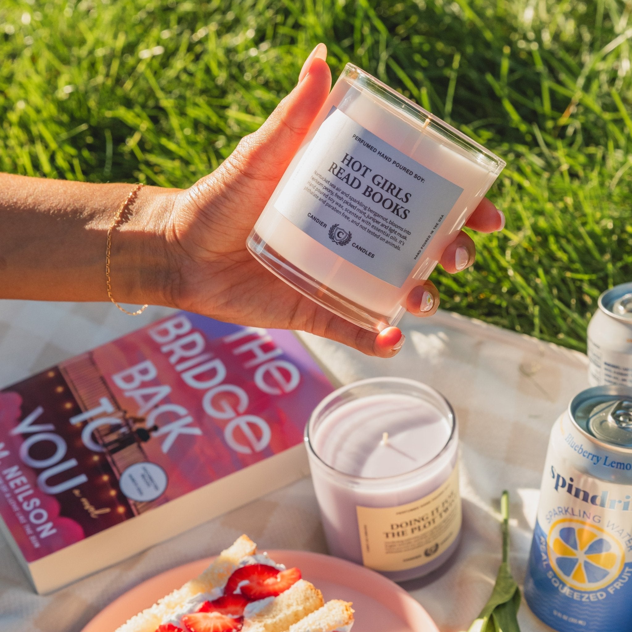 Pink college dorm candier candle styled as preppy dorm room decor for college girls