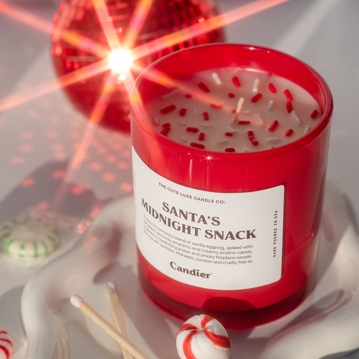 Pretty Christmas candle by Candier ā luxe aesthetics for holiday parties; cute candles for Christmas gifts for friends, sisters, and teens.