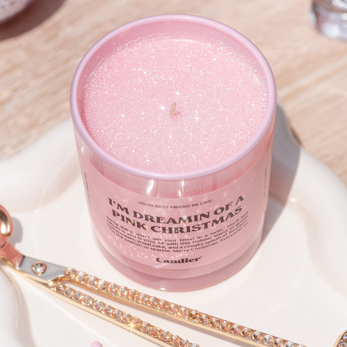 Top view of Candier pink glitter candle â a cute Christmas scented candle with sparkly finish, perfect for girly aesthetic holiday gifts.