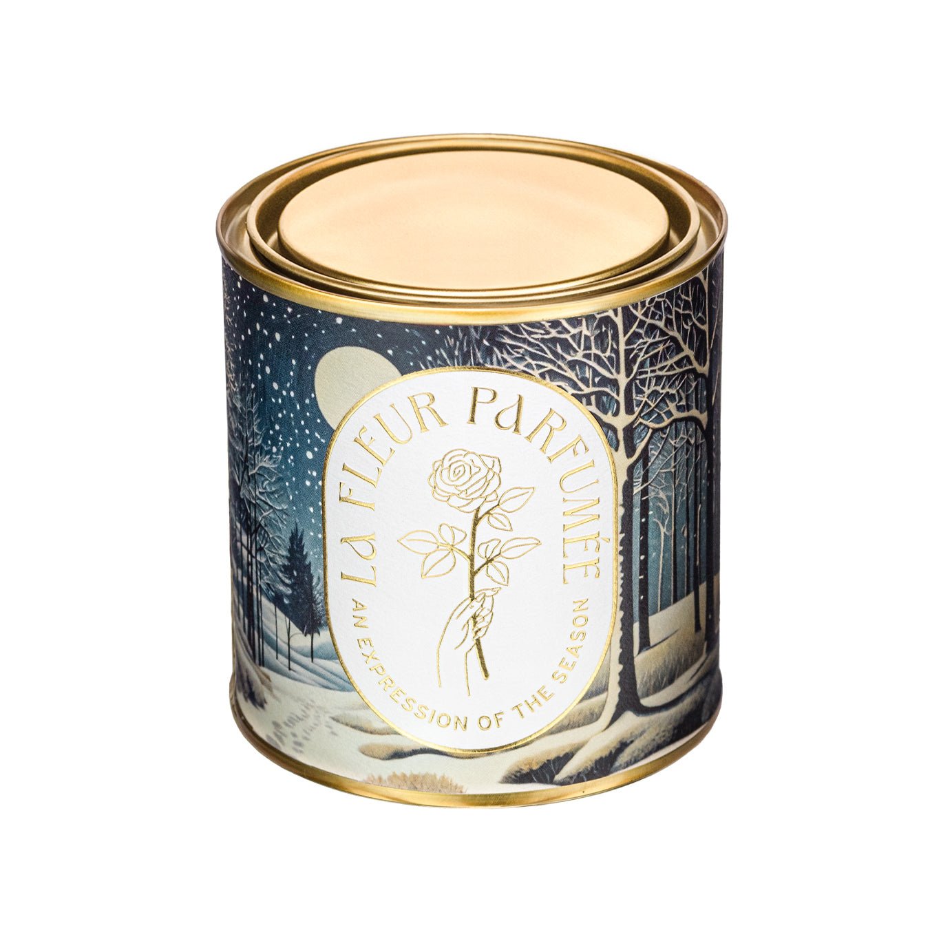 An elegant luxe lgold-tone candle, wrapped in artwork of a peaceful winter Detail of Winter Solstice lid—elevated holiday candles design; smart pick for best Secret Santa gifts or Hanukkah gifts.