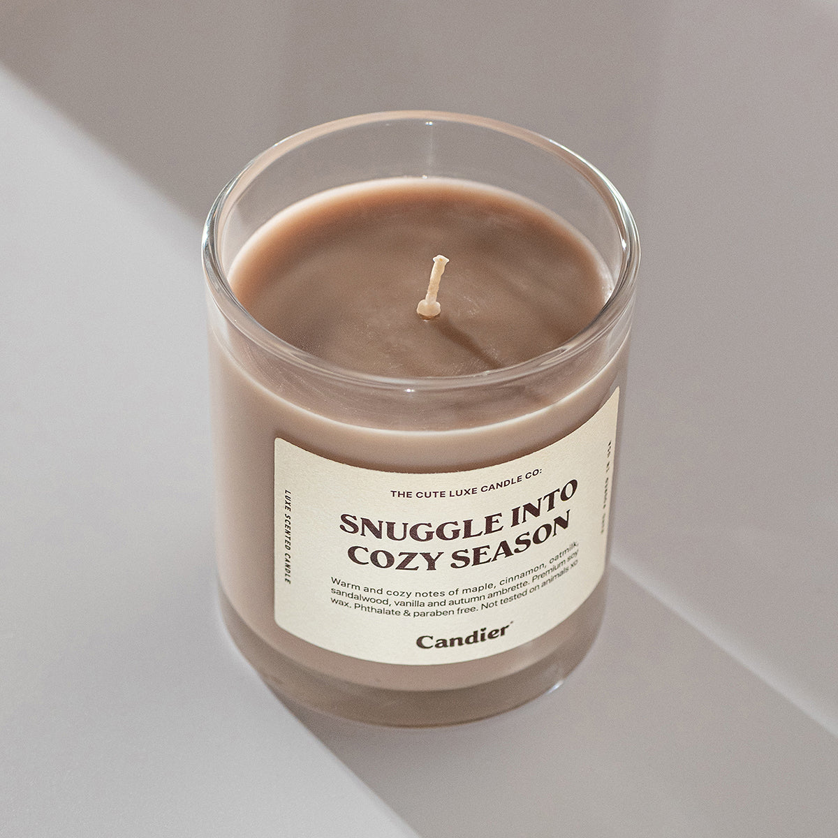Cozy Candier candle Snuggle Into Cozy Season, designed for a cute aesthetic and cozy cashmere candle experience.