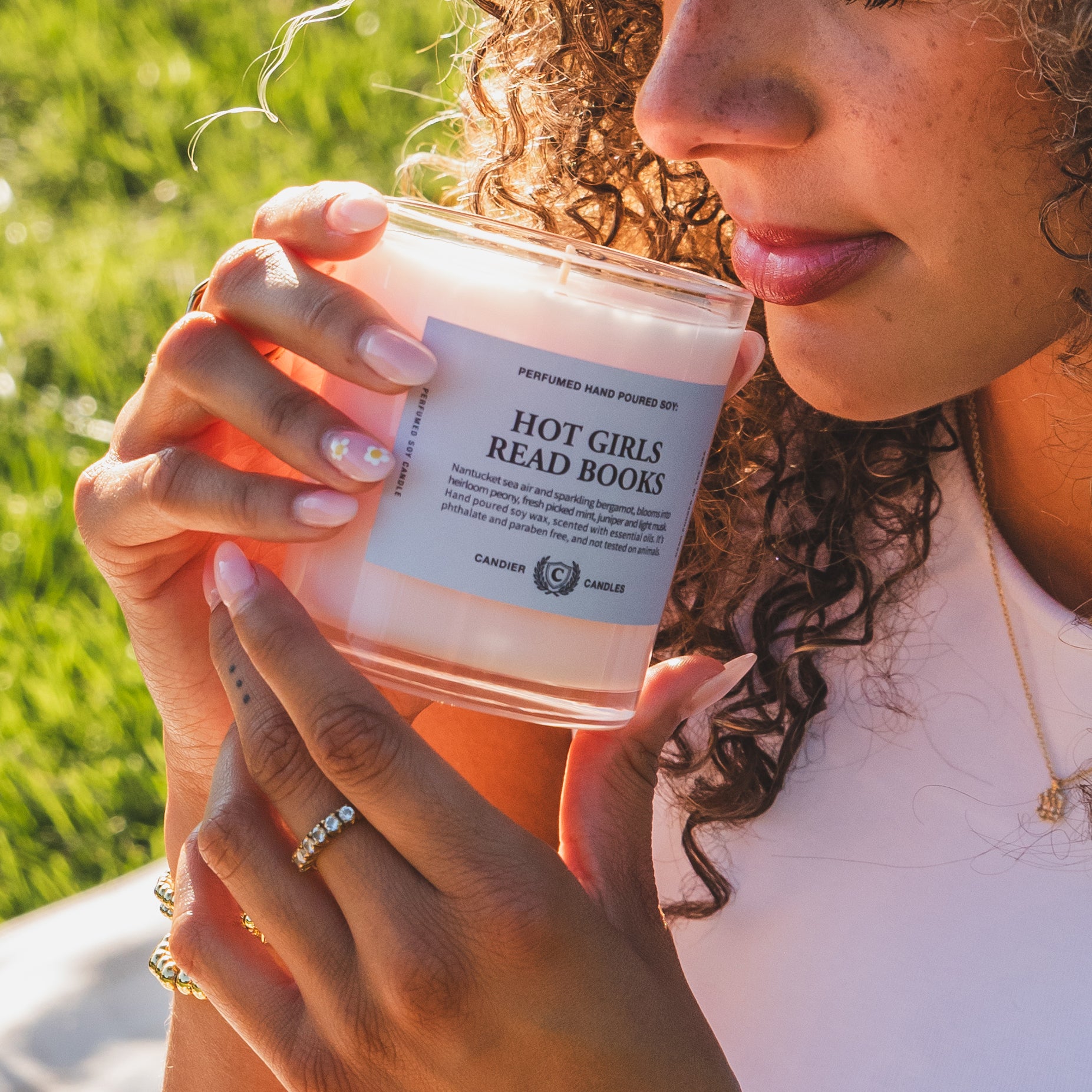 Hot Girls Read Books pink candle styled as cute college dorm room decor