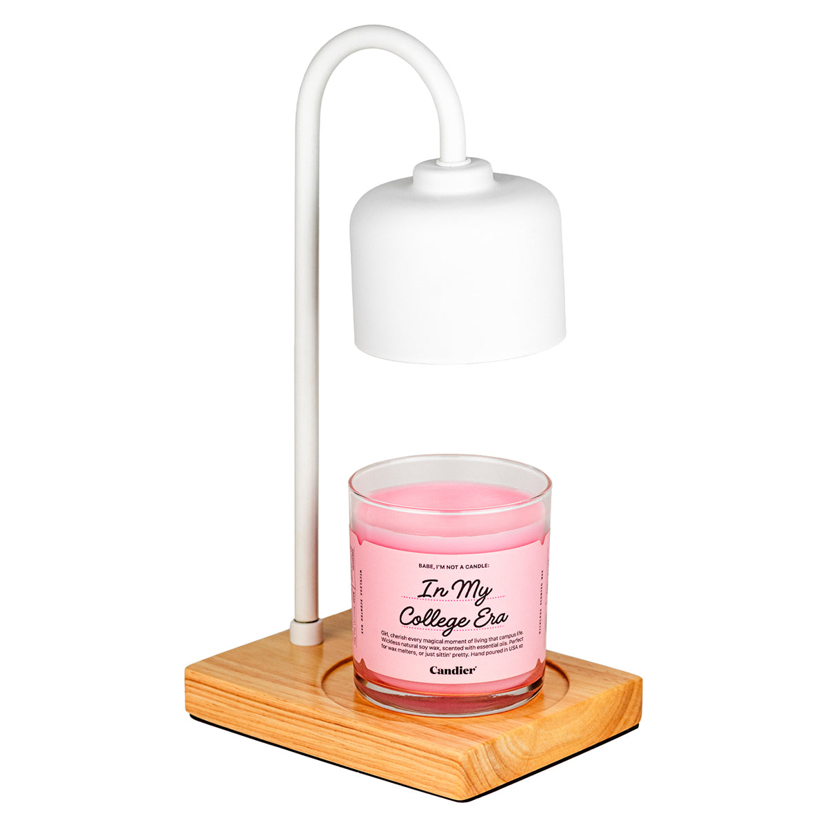 Flameless wax melt lamp with pink Candier candle on a wooden platform. Cute electric candle warmer for dorm room decor