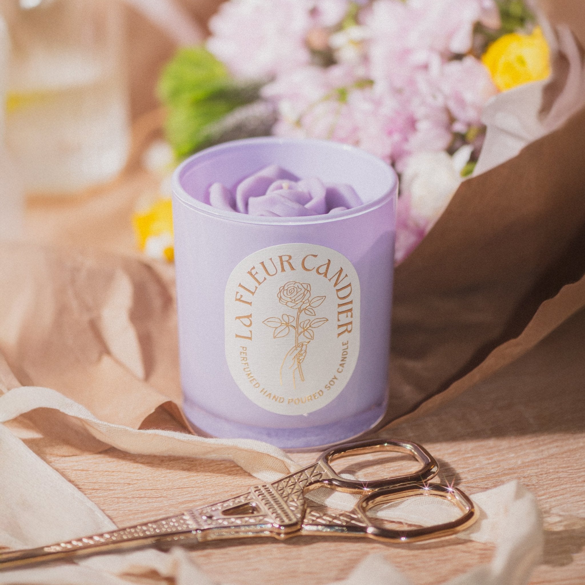 Jasmine Sambac flower candle by Candier candles styled on a desk, a floral candle for cute room decor and soft girl aesthetic