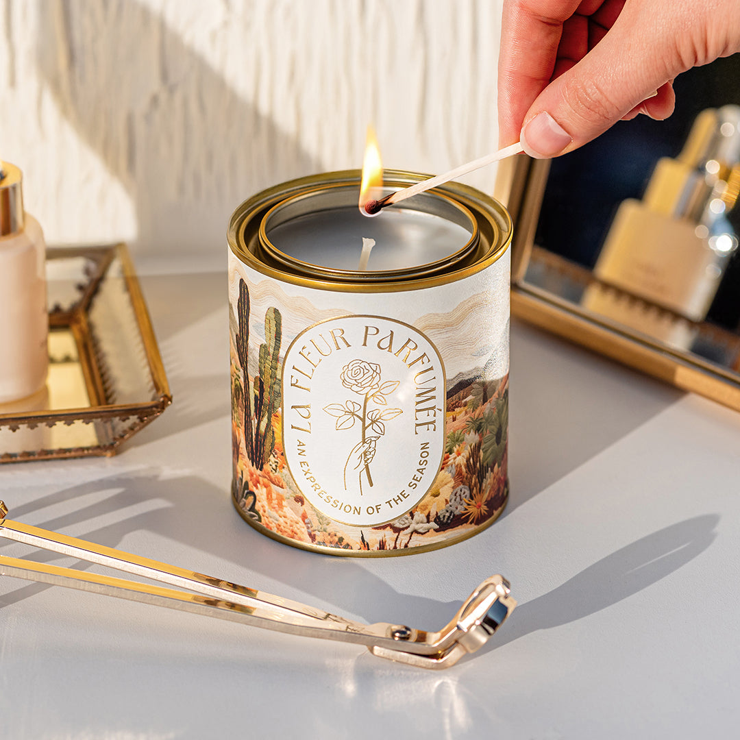 Luxury candles with clean fragrance and California desert-inspired notes like palo santo and pinon pine, hand-lit moment. Smells like joshua tree glamping