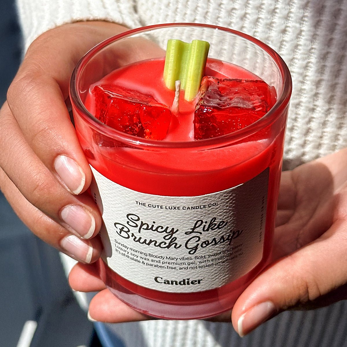 Luxury tomato leaf and Bloody Mary candle in hand – clean-scent cocktail candle with realistic brunch drink details, perfect for tomato candle gifting.