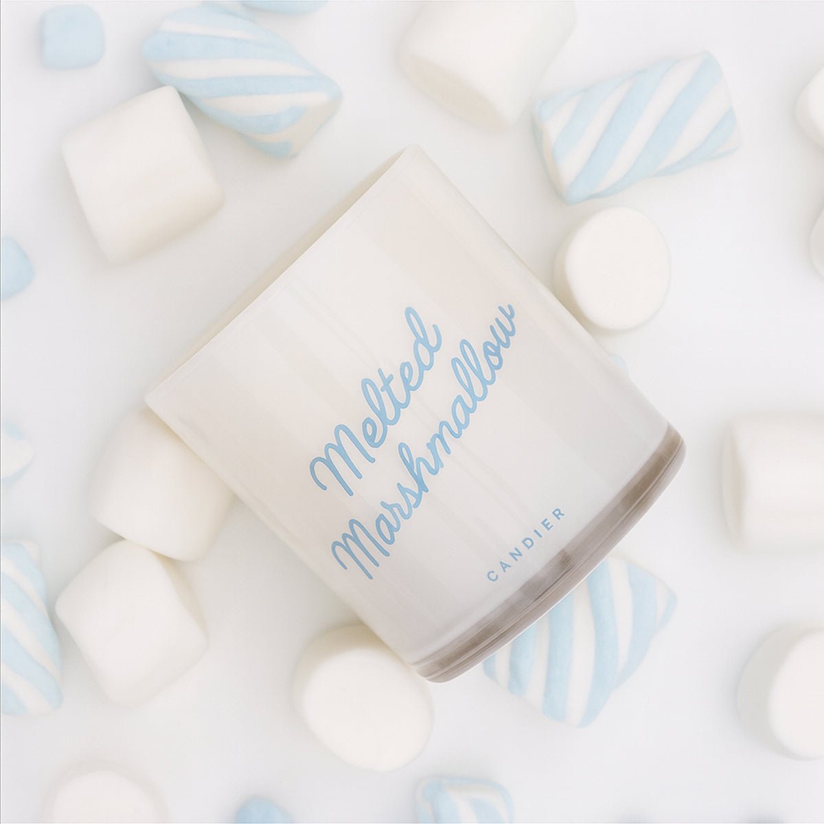 Aesthetic flatlay of Melted Marshmallow â cute candles for cute room decor and luxe aesthetics; cozy sweet scented candles vibe.