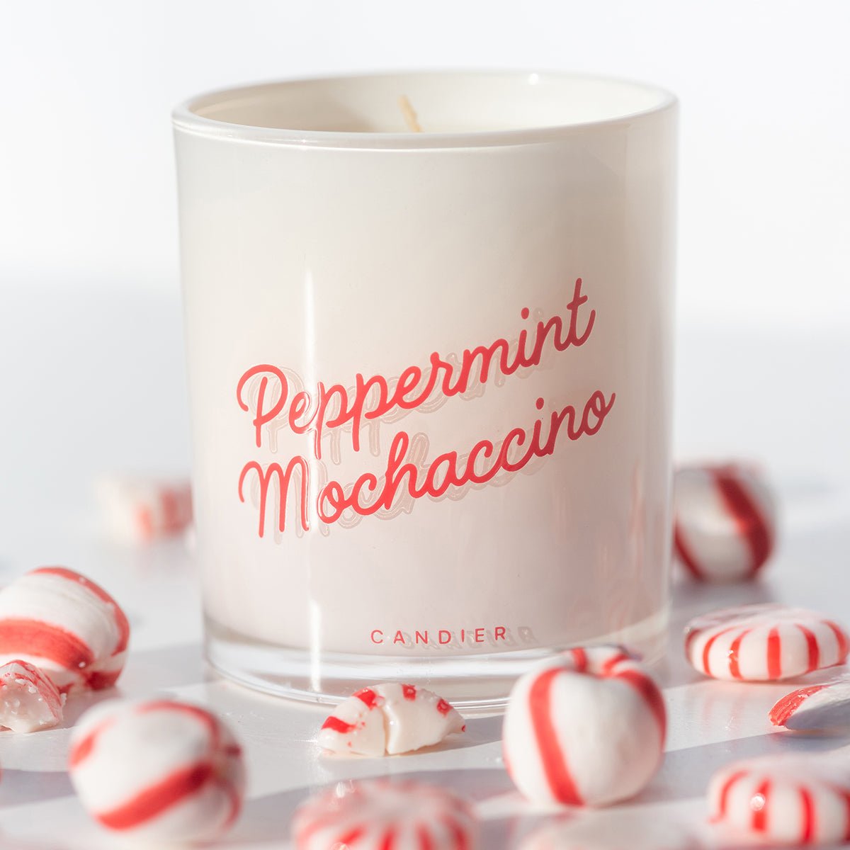 Minimal label shot—Peppermint Mochaccino lux candle; pretty, clean-burn holiday candle for stylish gifting.
