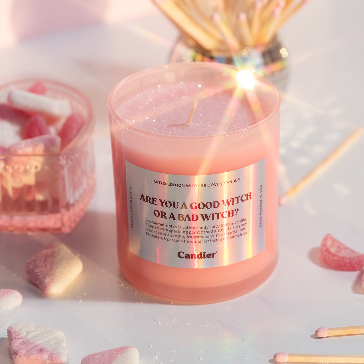 Pink Candier® Halloween candle styled with vanity accessories, showing soft girl aesthetic and luxe holiday décor vibes, ideal for cute room decor and pretty candle lovers.