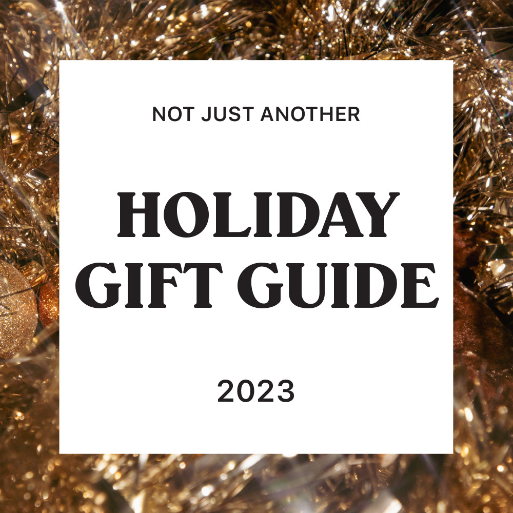 A festive glittery image which reads Not Just Another Holiday Gift Guide 2023