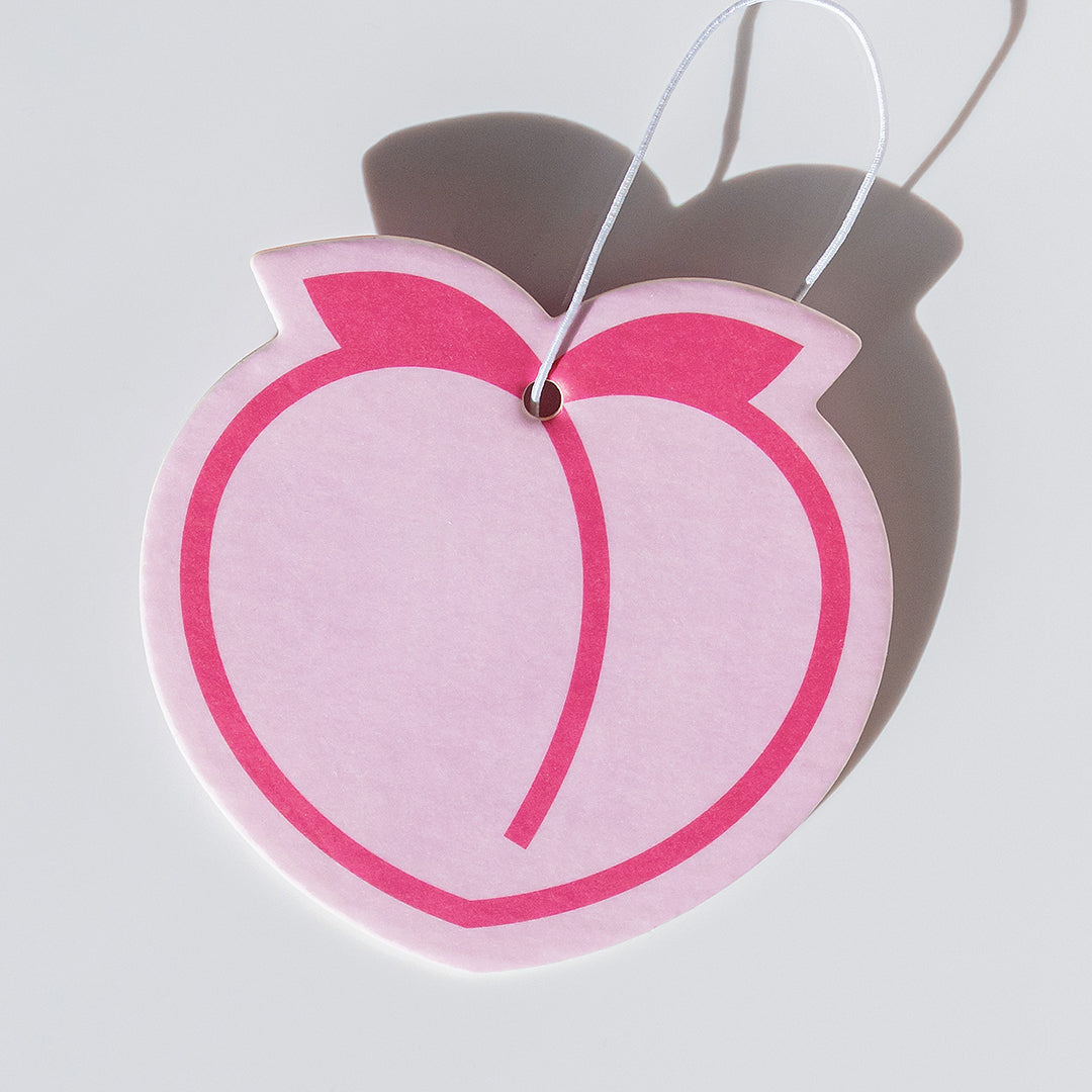 Peach emoji air freshener – A cute car air freshener with a juicy fresh peach scent. Fun, fruity & long-lasting for home, cars & more!