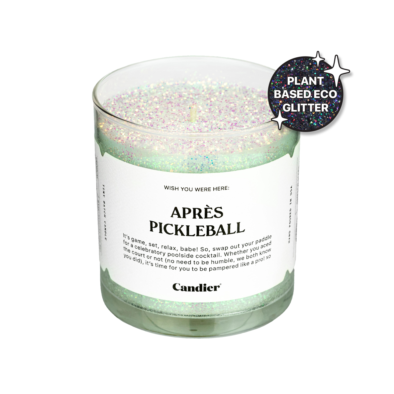 A sparkling green candle with plant based glitter and a label that reads Aprés Pickleball. Gifts for pickleball players​