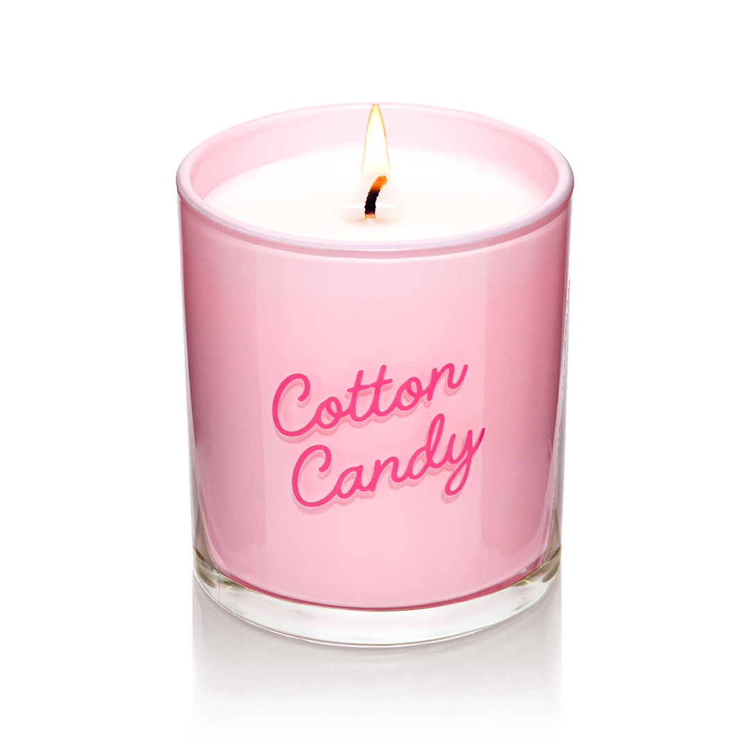 Candier Cotton Candy candle in glossy pink glass with cursive logo. A luxe soy wax dessert candle with sweet vanilla fragrance and candyfloss gourmand scent.