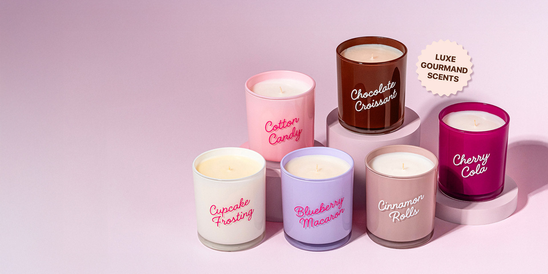 Candier luxury Dessert candles with vanilla fragrance and gourmand scent on soft girl era pink aesthetic background