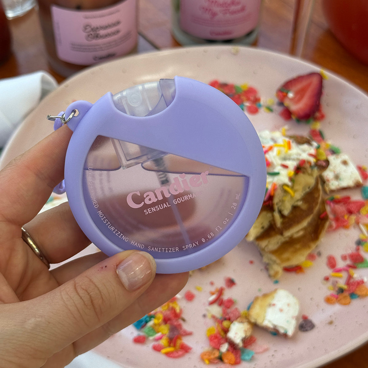 Candier cute scented hand sanitizer with keychain holder​. Smells like sweet gourmand scent and dessert fragrance 