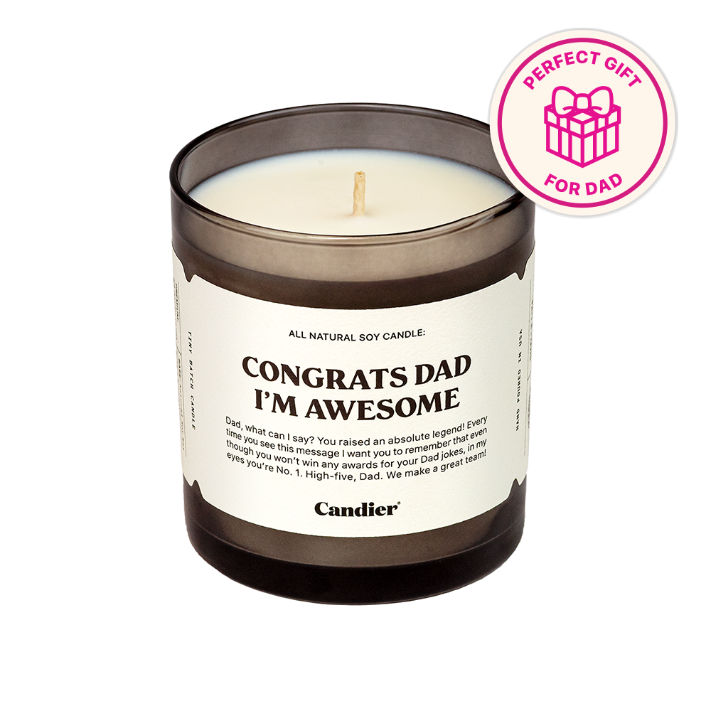 a manly looking candle with a label that reads Congrats Dad I'm awesome, and a badge that says Perfect gift for dad