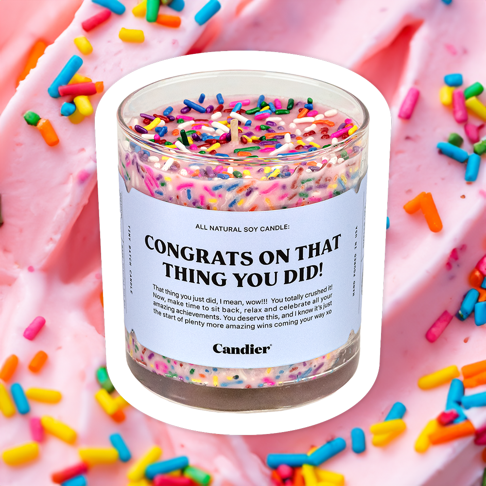 Dessert-inspired Candier candle with vibrant sprinkles. A cute congratulations gift​ and trendy gift for women, this strawberry shortcake candle​ is perfect for celebrating achievements