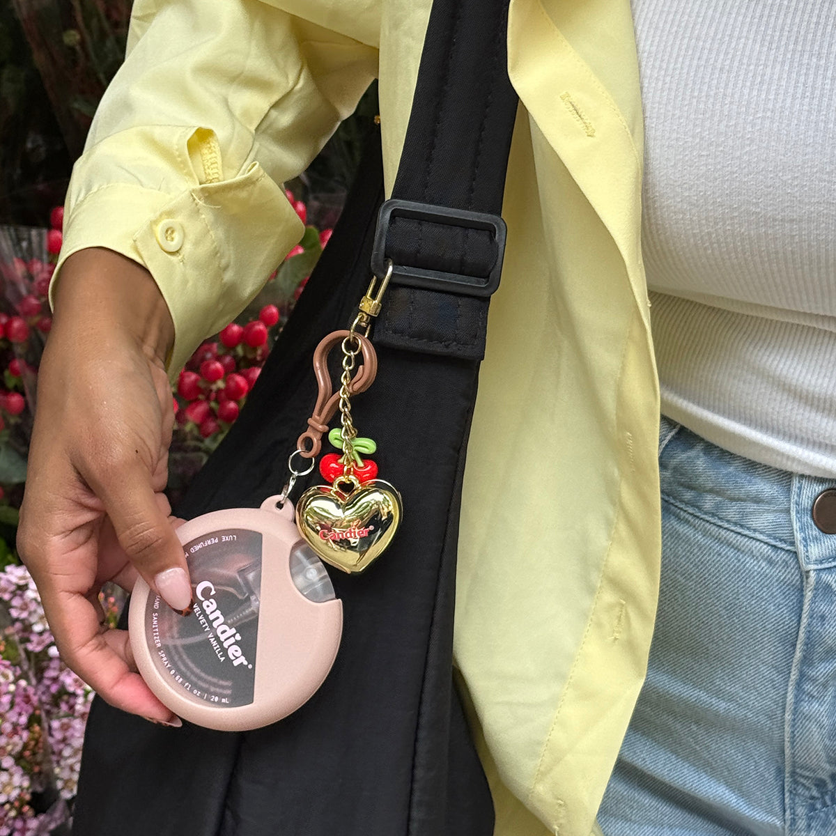 Candier cute hand sanitizer holder​ with keychain to clip onto bag. Vanilla fragrance and sweet gourmand scent 