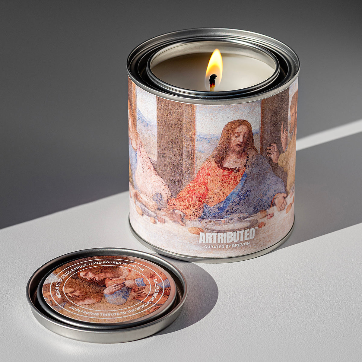 A lit candle depicting Leonardo da Vinci The Last Supper art