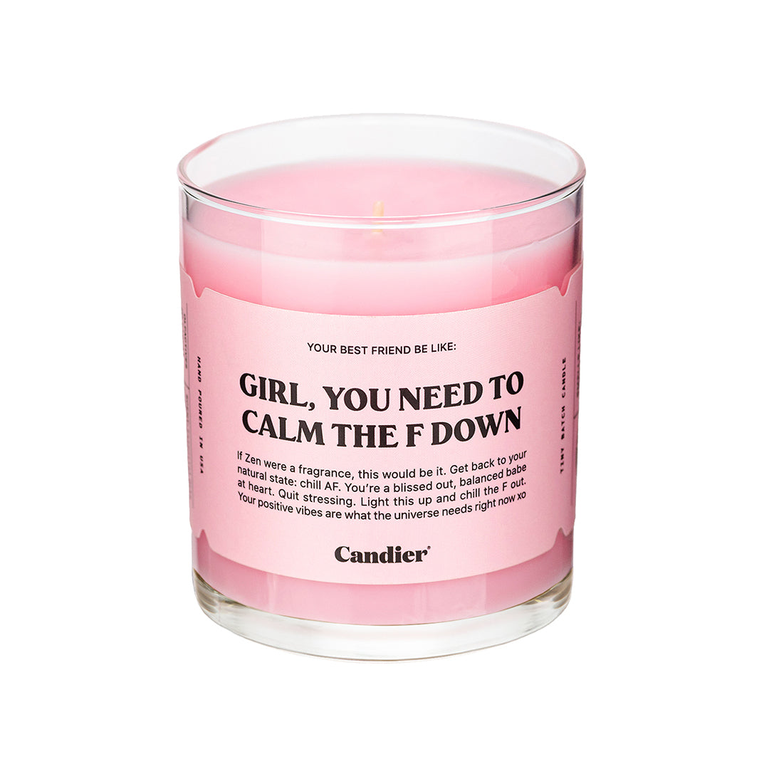 A pink "Girl, You Need To Calm The F Down" candle by Candier, a calming and relaxing soy wax candle with a clean burn. Best cherry blossom scent​.