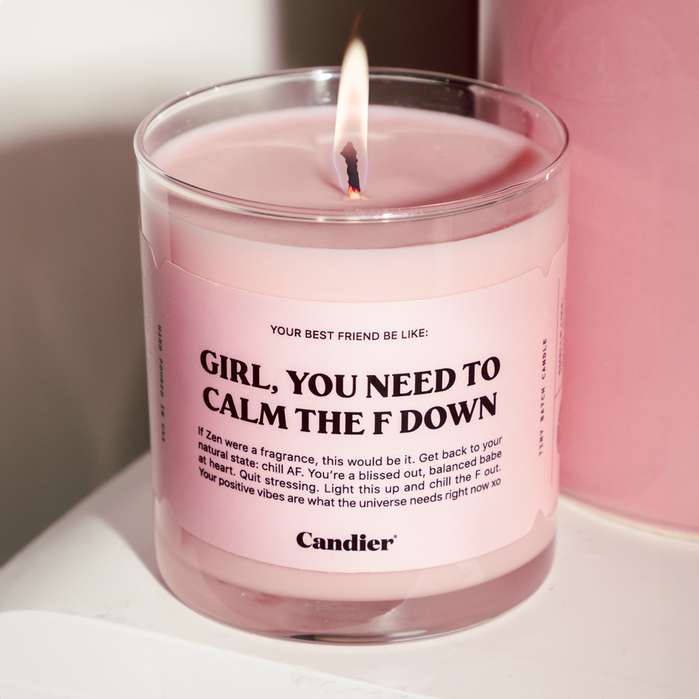 A detailed view of the "Girl, You Need To Calm The F Down" candle, highlighting its aesthetic pink wax and fun sassy messaging. Cherry blossom scent​ funny candle for women