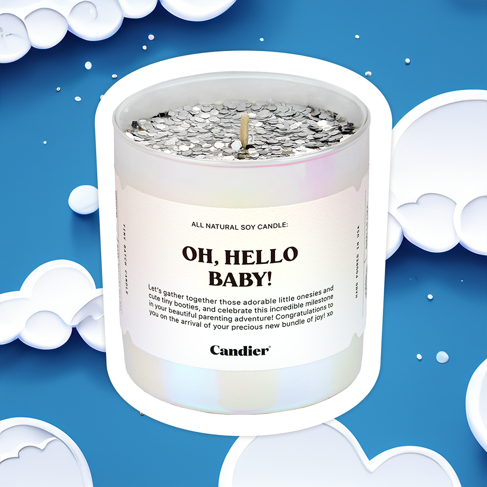 a sparkly candle with a label that reads Oh hello baby and a background of white clouds on a blue sky
