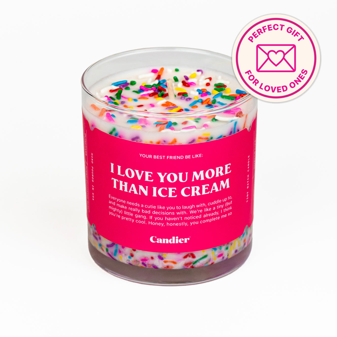 A colorful candle with a label that's reads I love you more than ice cream, and a badge that says perfect gift for loved ones 