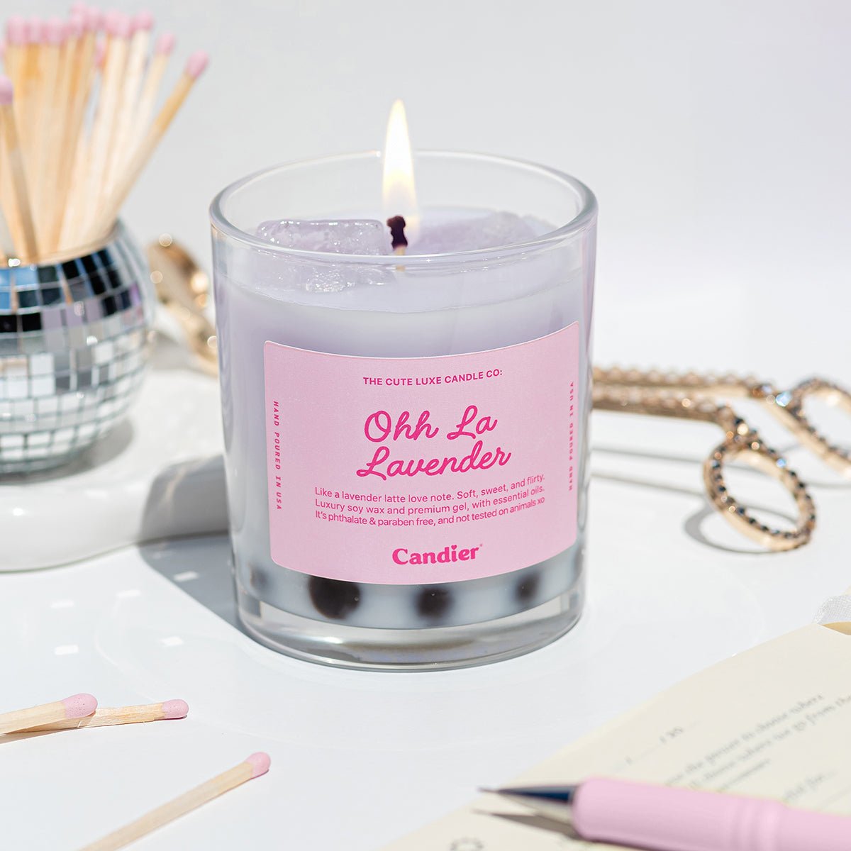 Lavender matcha candle labeled 'Ohh La Lavender' with cute pink aesthetic safety matches by Candier