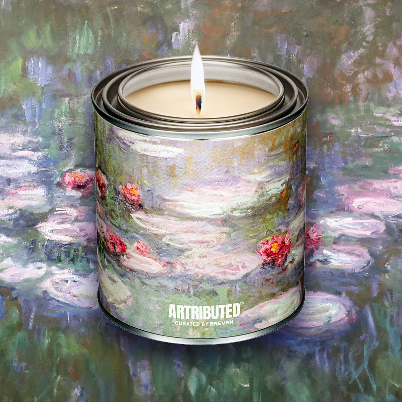 A lit candle featuring the artwork Water Lilies by Claude Monet, with a background filled with the impressionist masterpiece 