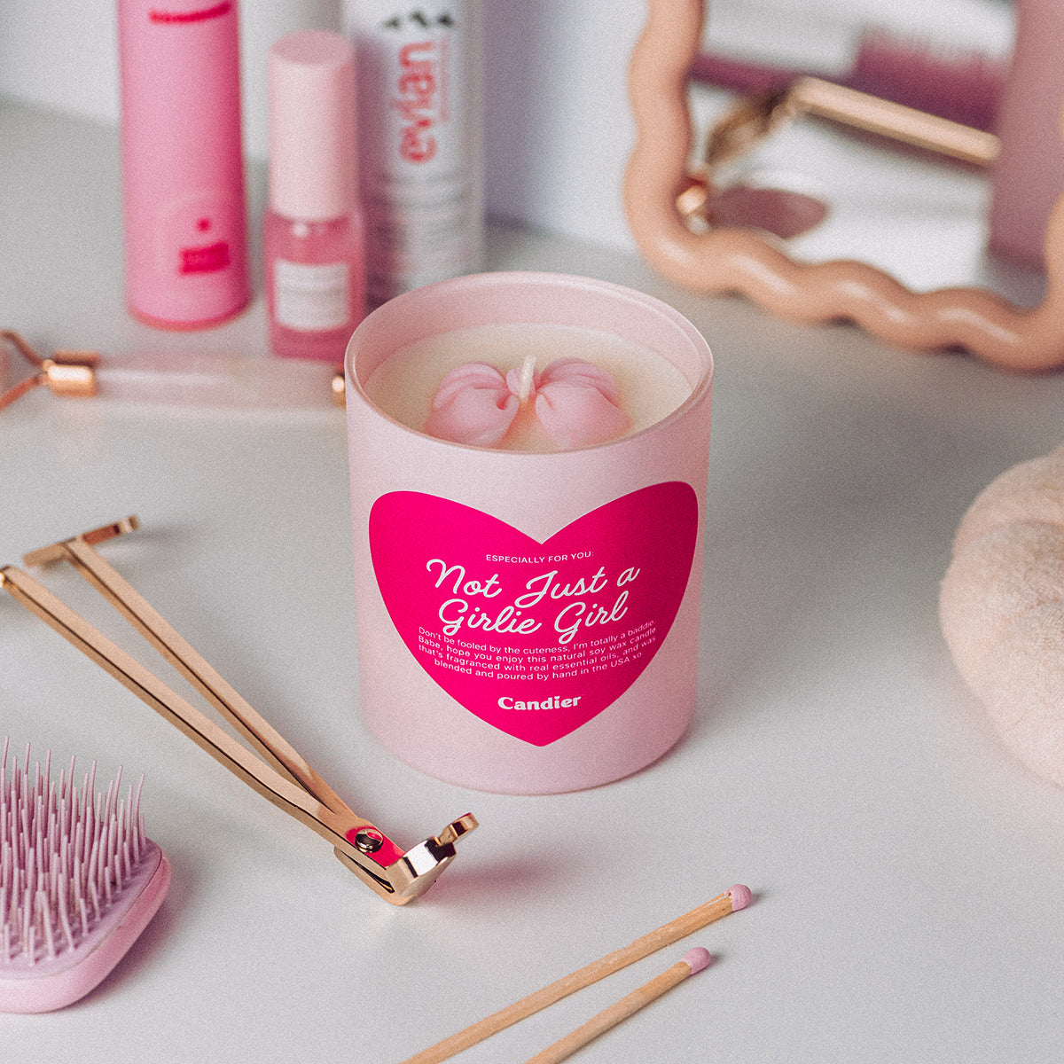 Not Just a Girlie Girl coquette candle, crafted with clean soy wax and a sculpted pink bow. A luxury fragrance with flirty, feminine notes—the ultimate cute candle gift for her, daughters, and fancy candle lovers