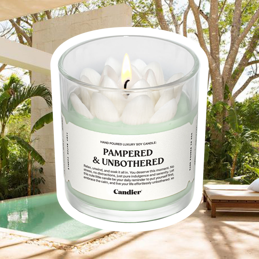 Candier candles Pampered and Unbothered luxe spa candle with elegant sculpted wax white lotus flower detail. Clean scented spa candle hand made in USA.
