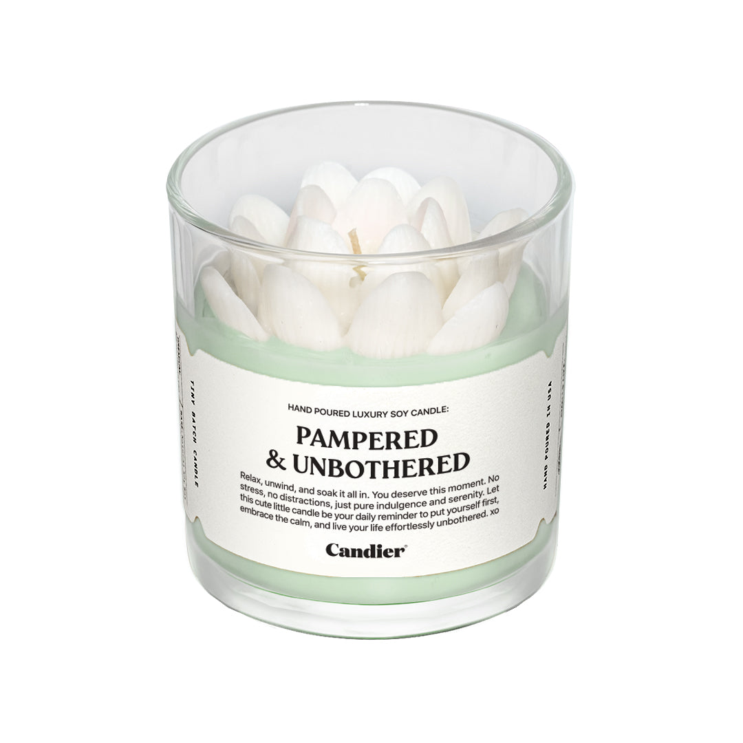 Candier Pampered and Unbothered luxury spa candle with hand-poured  white lotus flower soy wax design. Clean scented spa candle made in USA.