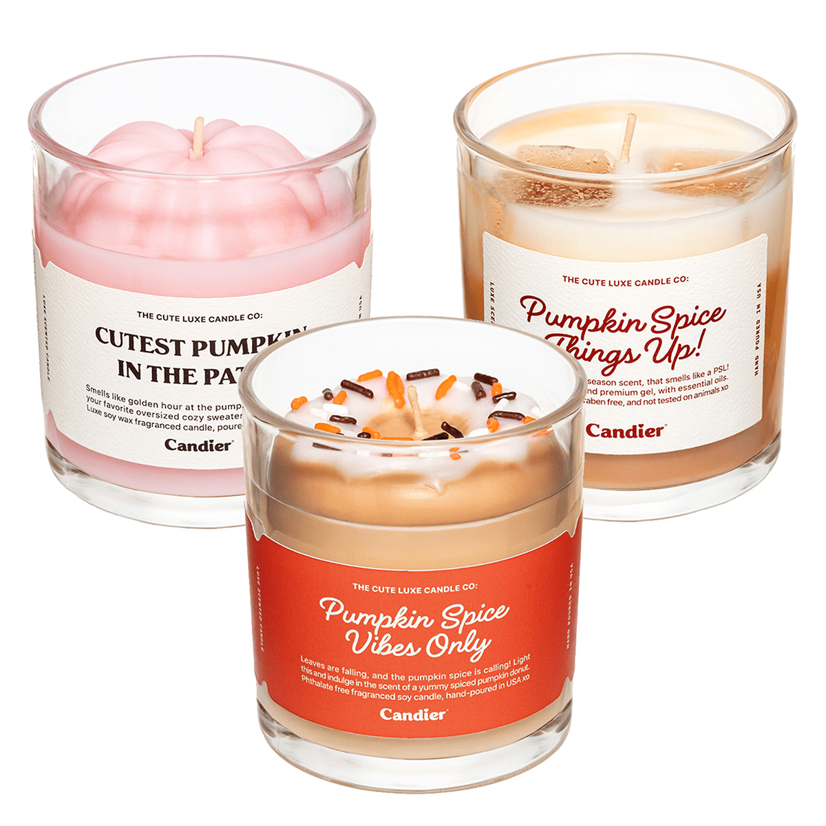 Three Candier fall scented candles—Cutest Pumpkin in the Patch (pink pumpkin topper), Pumpkin Spice Things Up (PSL with gel “ice”), and Pumpkin Spice Vibes Only Donut (sprinkles donut)—cozy pumpkin spice candle gift set.