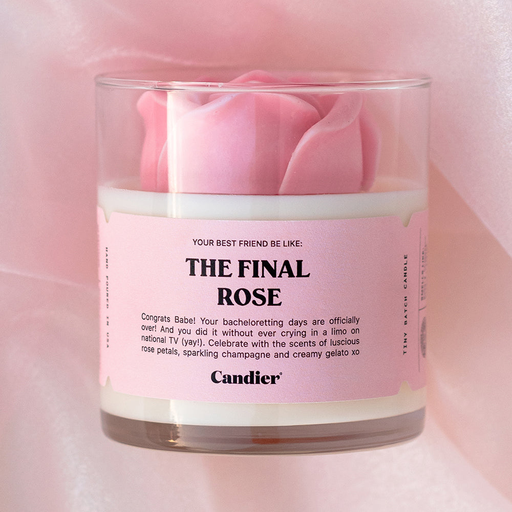 a sculpted rose candle with a label that reads The Final Rose