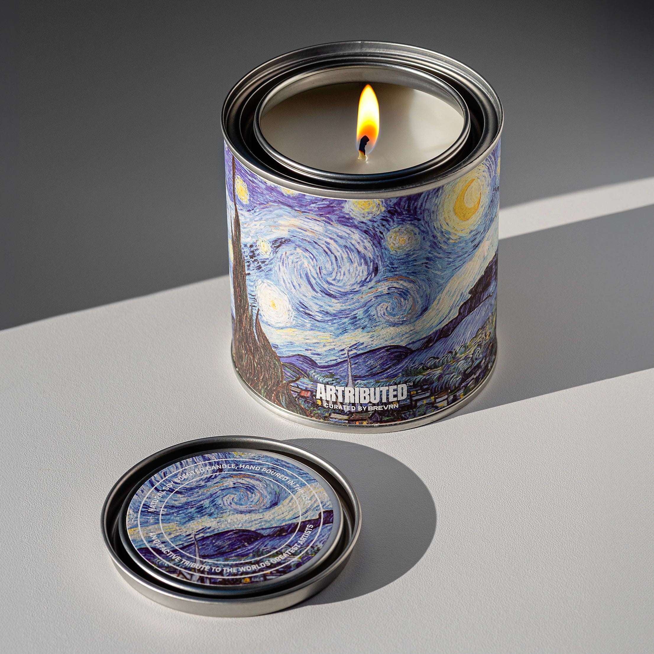 Fine art candle inspired by Vincent van Gogh's Starry Night, wrapped in a high quality reproduction of the famous painting