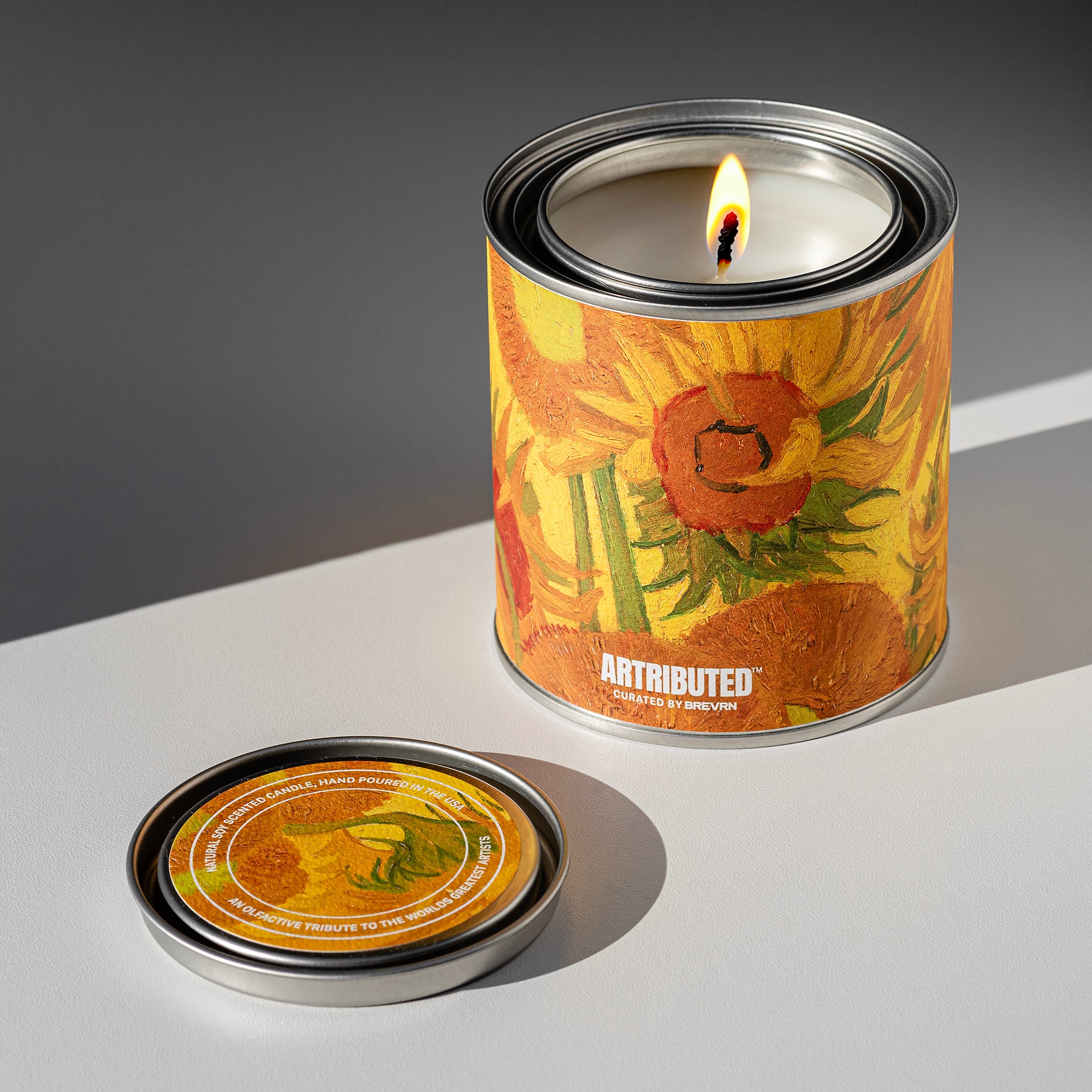 Fine art candle inspired by Vincent Van Gogh's Sunflowers, wrapped in a high quality reproduction of the famous painting