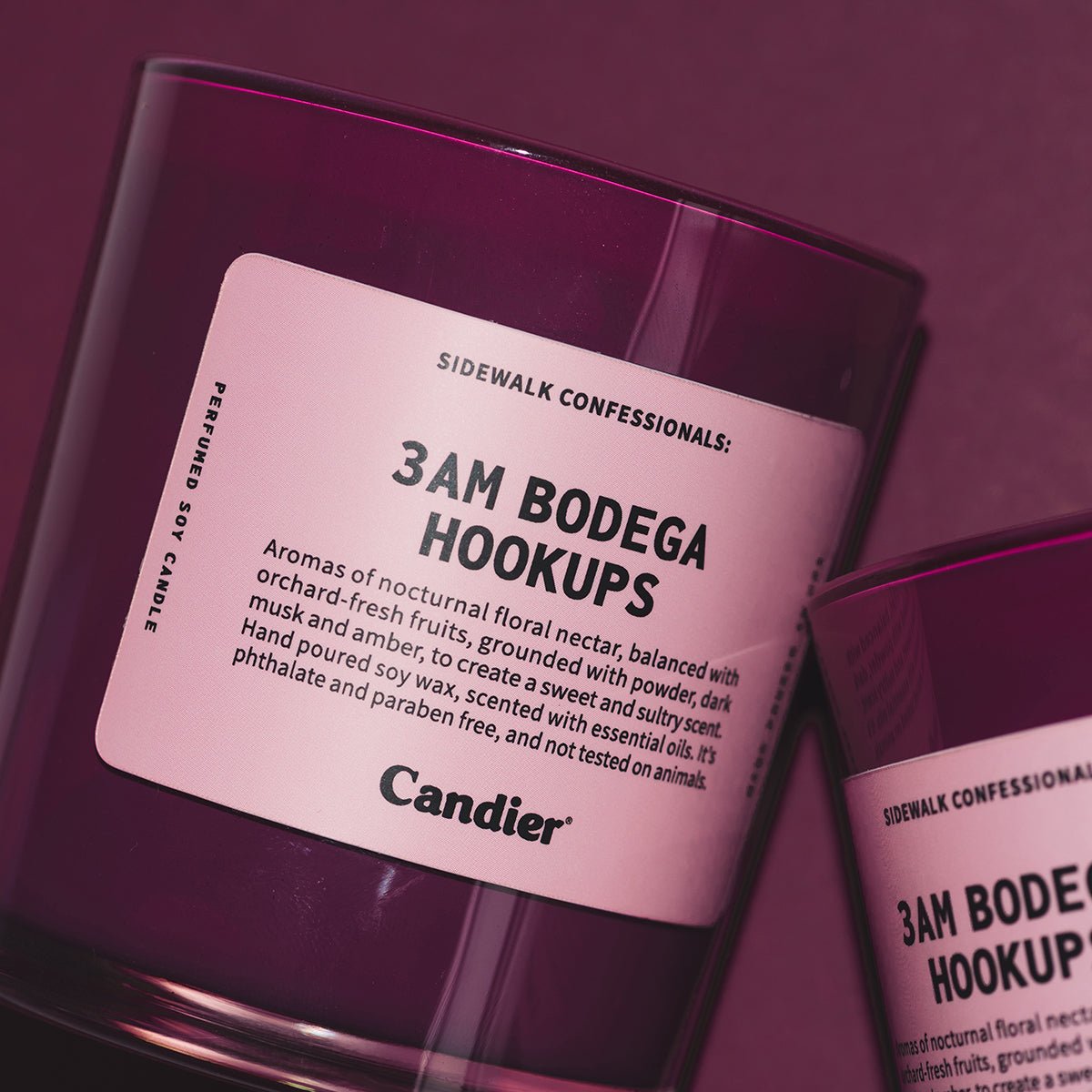 Close up of Candier 3AM Bodega Hookups candle, cute candles with pink candle aesthetic and dessert candle vibe