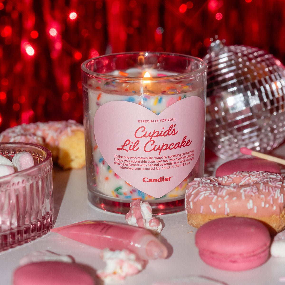 Candier Cupid’s Lil Cupcake Valentine candle styled with pink desserts and decor, a romantic candle gift for girlfriends and women